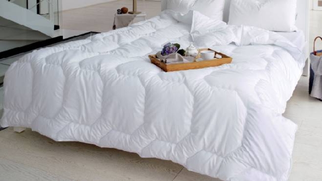 come scegliere il piumino per il letto